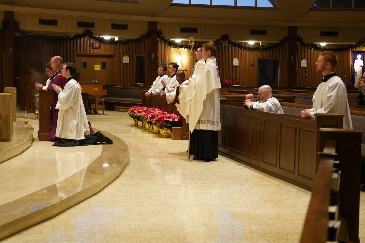 Bishop W. Shawn McKnight joins the seminarians of the Jefferson City diocese in Adoration before the Most Blessed Sacrament during Evening Prayer and a Holy Hour for Vocations in the diocese, on Dec. 21 in the Cathedral of St. Joseph. Several priests and laypeople joined them.